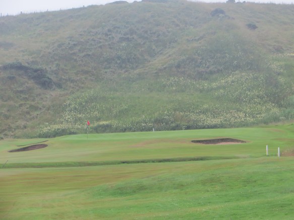 Resplendent view from the 10th tee a the dune wall that shadows the holes coming in.
