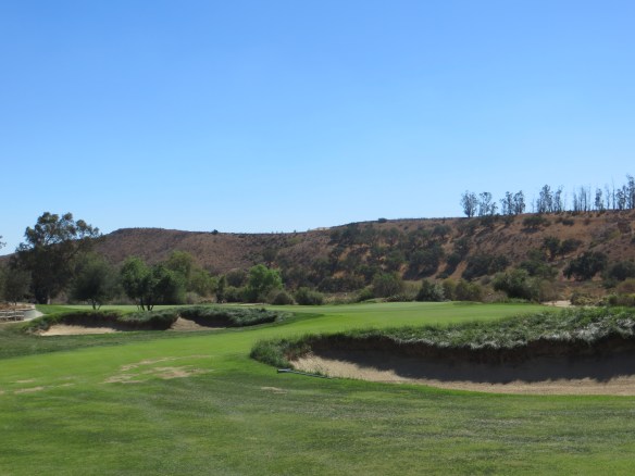 One last set of steeplechase hurdles coming down the finishing hole