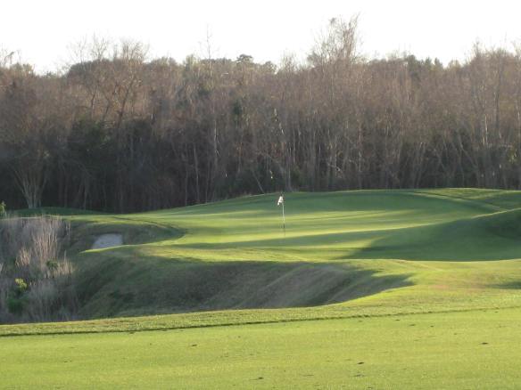 Across a tight rope to the 16th green dangling on the edge