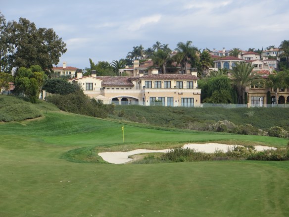 Small bungelow overlooks the downhill shot into #4