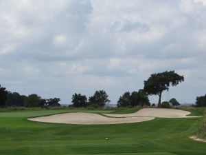 Even the trees behind 17 suggest the pitch of this green you must negotiate